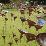 A field of ceramic flowers