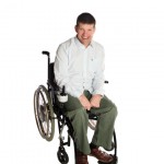 a photo of laurence clark in his wheelchair.