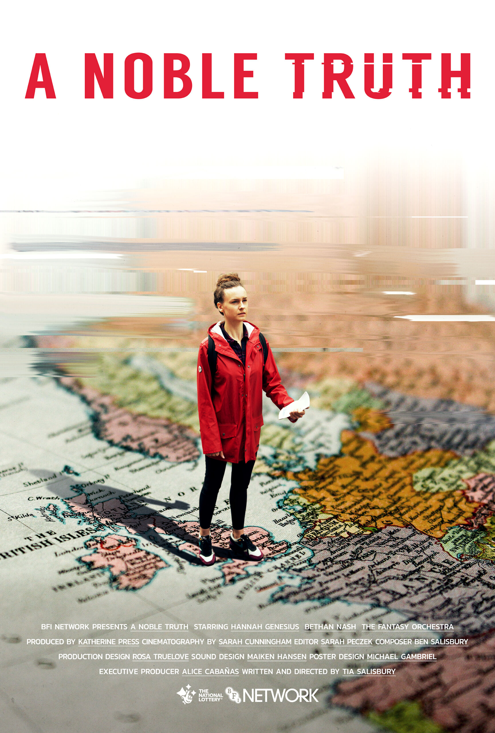 A woman in a red coat stands looking bewildered holding a piece of paper. We look at her standing looking comically large stood on a printed map of the world. However, her posturing and the angle looking down makes her look small.