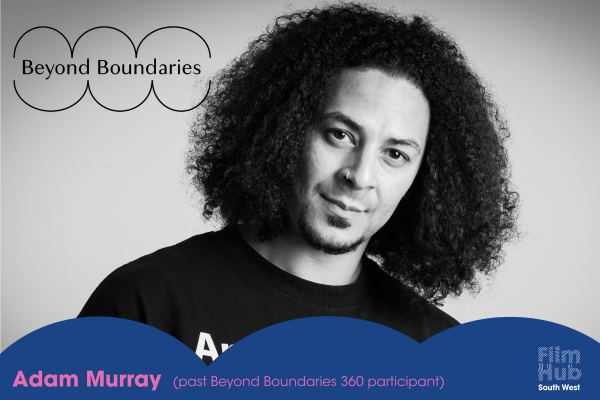 headshot of Adam Murray. black and white image, he smiles at the camera. he has large afro hair and wears a black t shirt. the beyond boundaries logo sits top left, and the bottom quarter of the image has a bumpy blue
