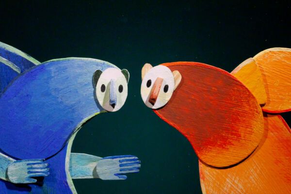 Two hand drawn paper creatures look towards each other inquisitively. on the left, the blue creature llooks like a llama or a bear. soft and blobby and friendly. On the right, the character is identical, only orange. the background is a plain deep green, and the figures take up most of the screen.