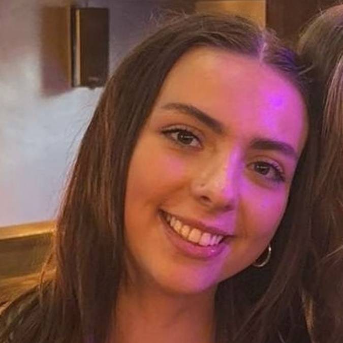 A woman smiling.
