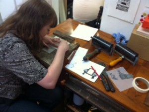 Louise cutting her Lino plate