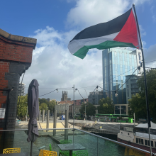 The Palestine flag flying from Watershed's balcony.