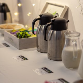 Photo of teas, coffees and milk on a table